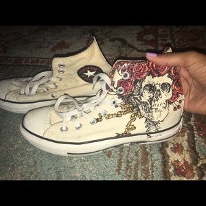 Skull and flame high-top Converse